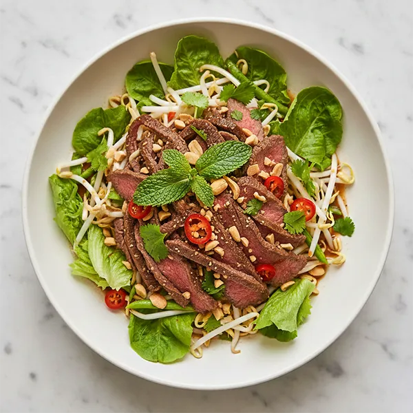 Thai Sliced Beef Salad with Peanut, Papaya, Bean Sprouts & Tamarind Dressing